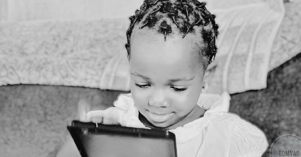 A child operating a tablet