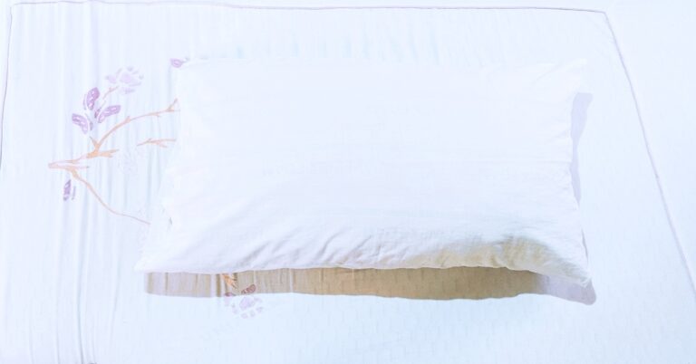A clean bed and pillow that will let you see how to break the cycle of waking up in the middle of the night