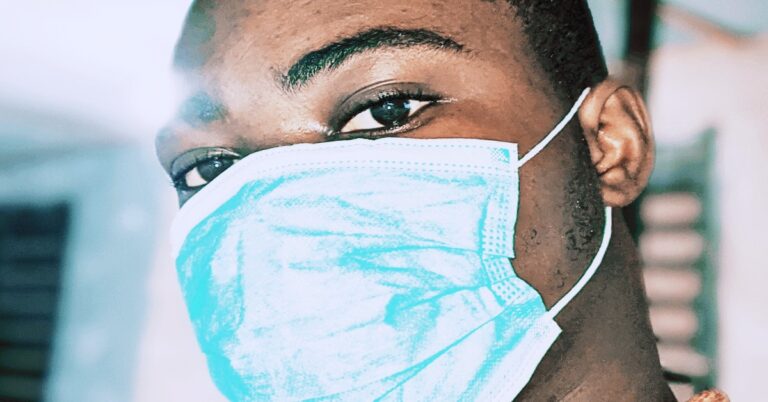 A man wearing a face masks and looking for where to buy face masks in Nigeria